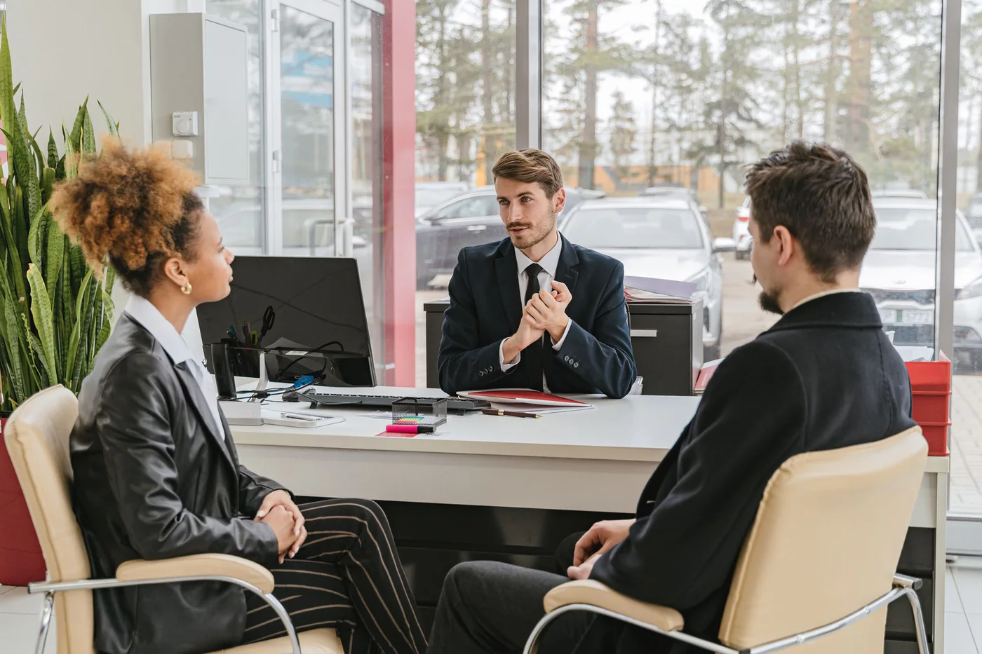Confident professional service business owners reviewing their growth